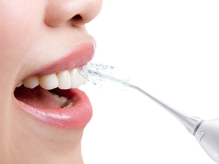 Как чистить зубы ирригатором
