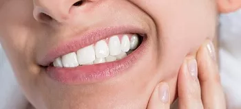 Болят нижние зубы: причины, методы лечения